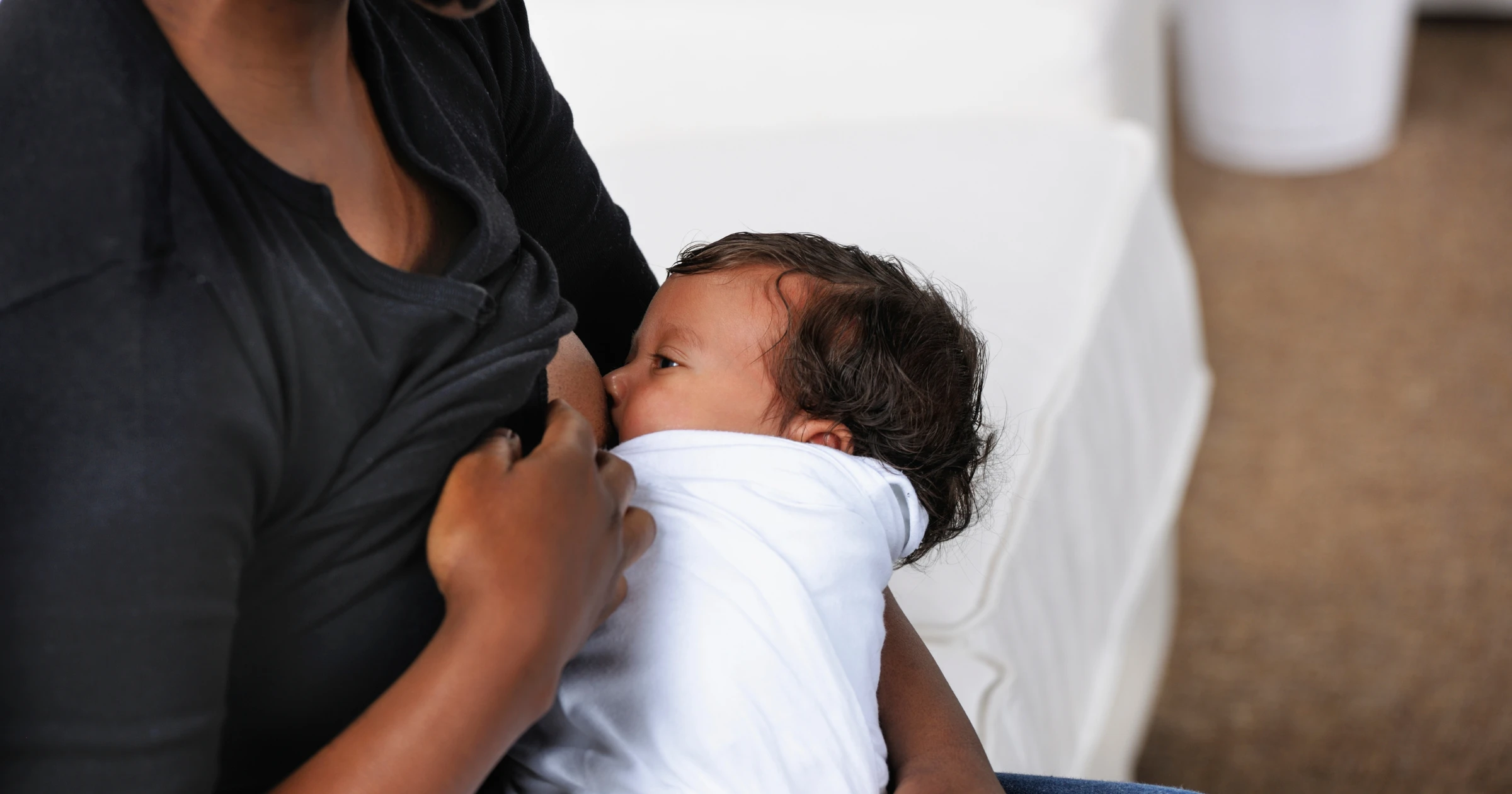 newborn baby sleeping and feeding