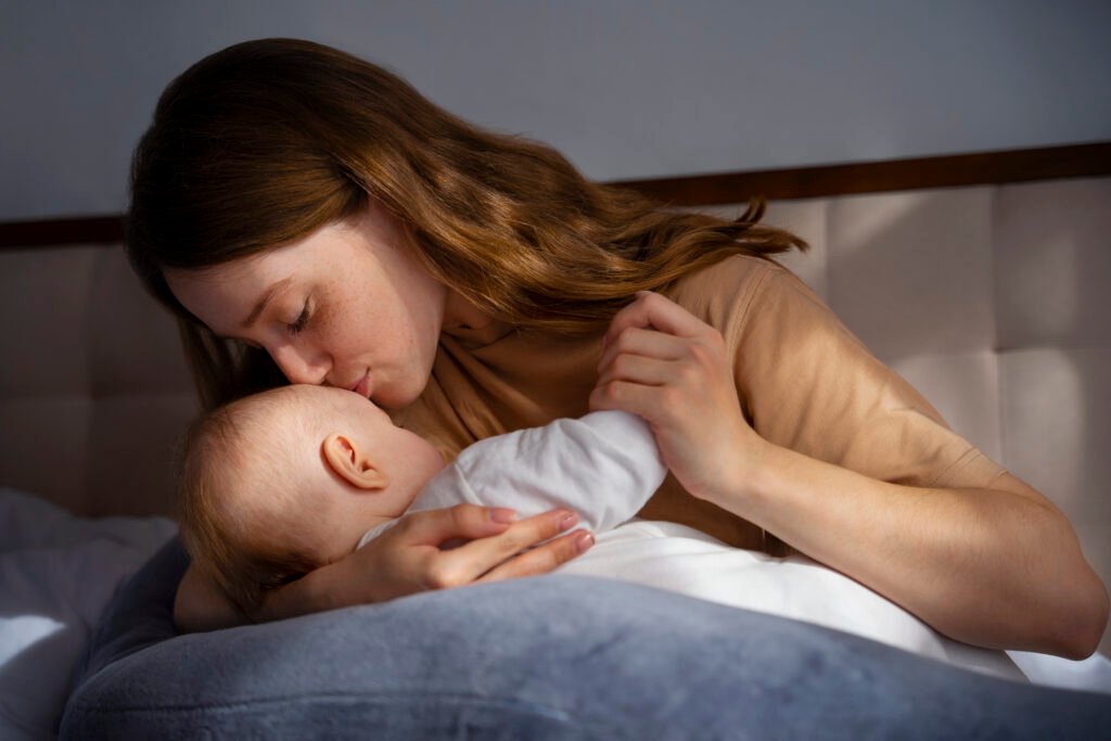 arent offering comfort beside baby’s cot as part of the rouse to sleep method