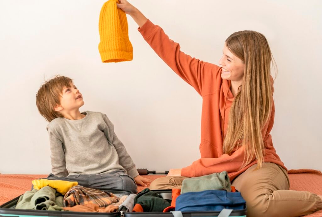 Toddler enjoying messy play with paint at childcare, wearing comfortable clothes—practical starting childcare tip for everyday care.