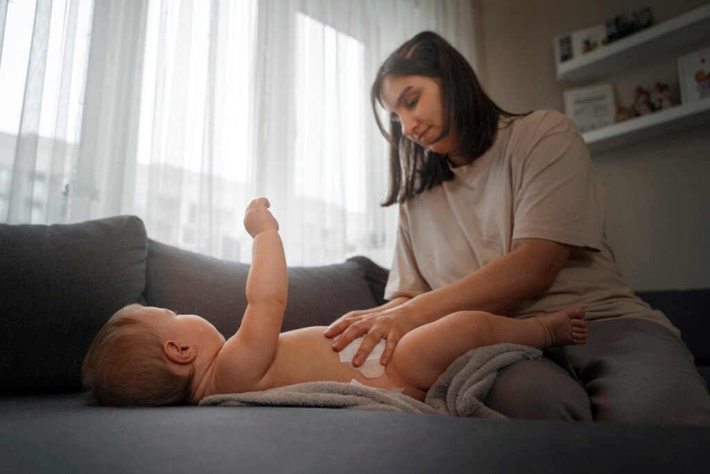 Consistent bedtime routine with bath, feed, and cuddle – baby rolling over tips for creating emotional safety during milestones.